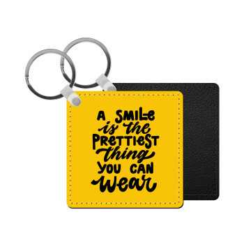 A smile is the prettiest thing you can wear, Μπρελόκ Δερματίνη, τετράγωνο ΜΑΥΡΟ (5x5cm)